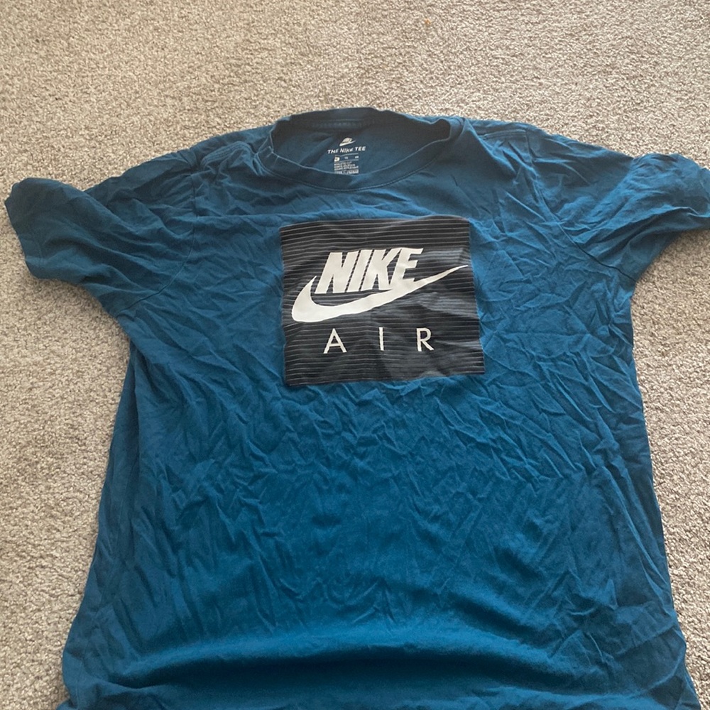 Blue and black Nike shirt